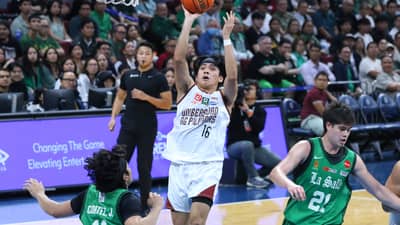 REY Remogat shoots his way to 20 points in University of the Philippines’ 80-76 win over defending champion La Salle on Sunday in Season 89 UAAP basketball tournament at the Mall of Asia Arena.