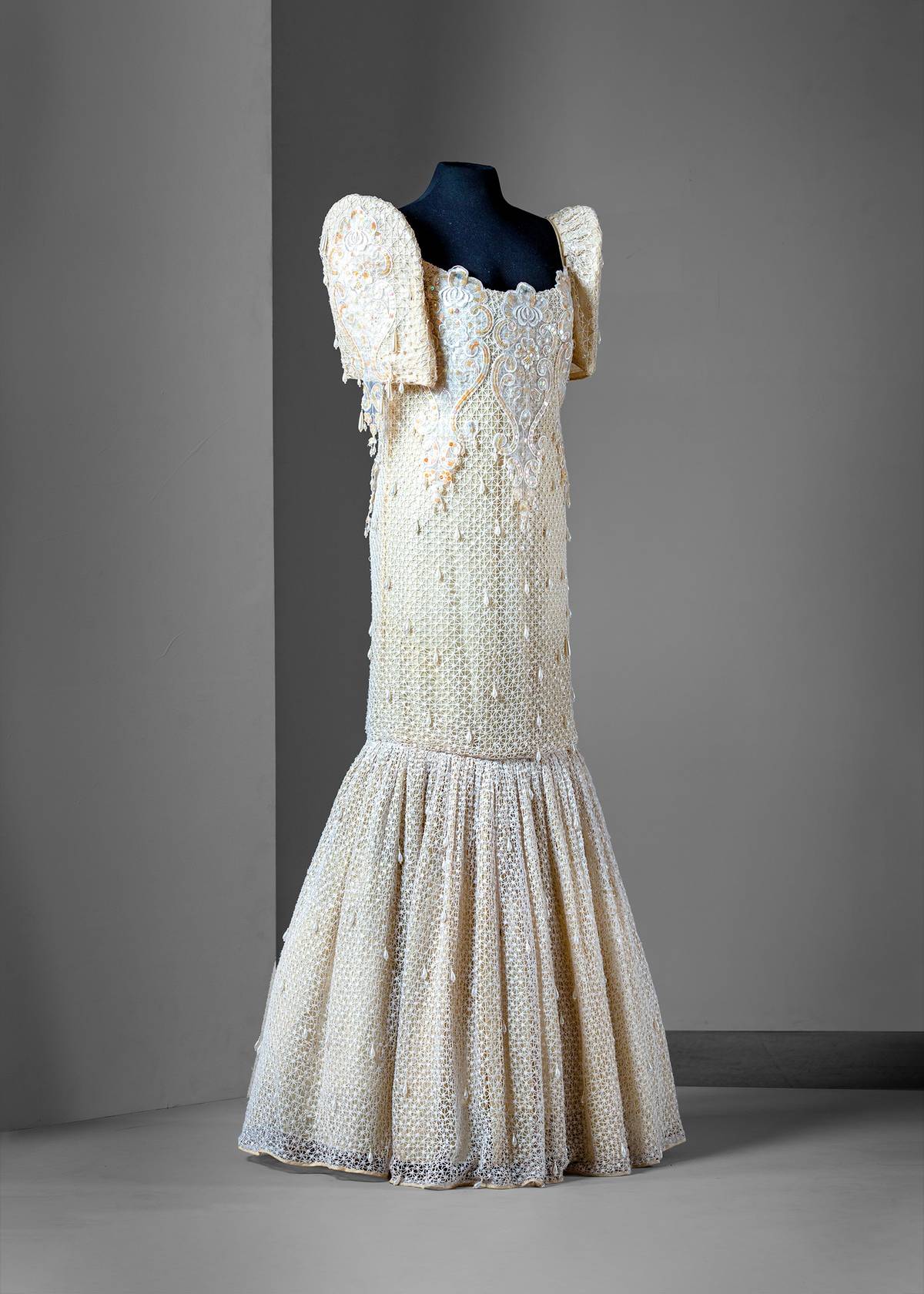 Ben Farrales (1932- 2021)
Mermaid-cut ivory lace terno embellished with beads and sequined appliqués, c. 1980s-1990s. A gift of the Farrales family.