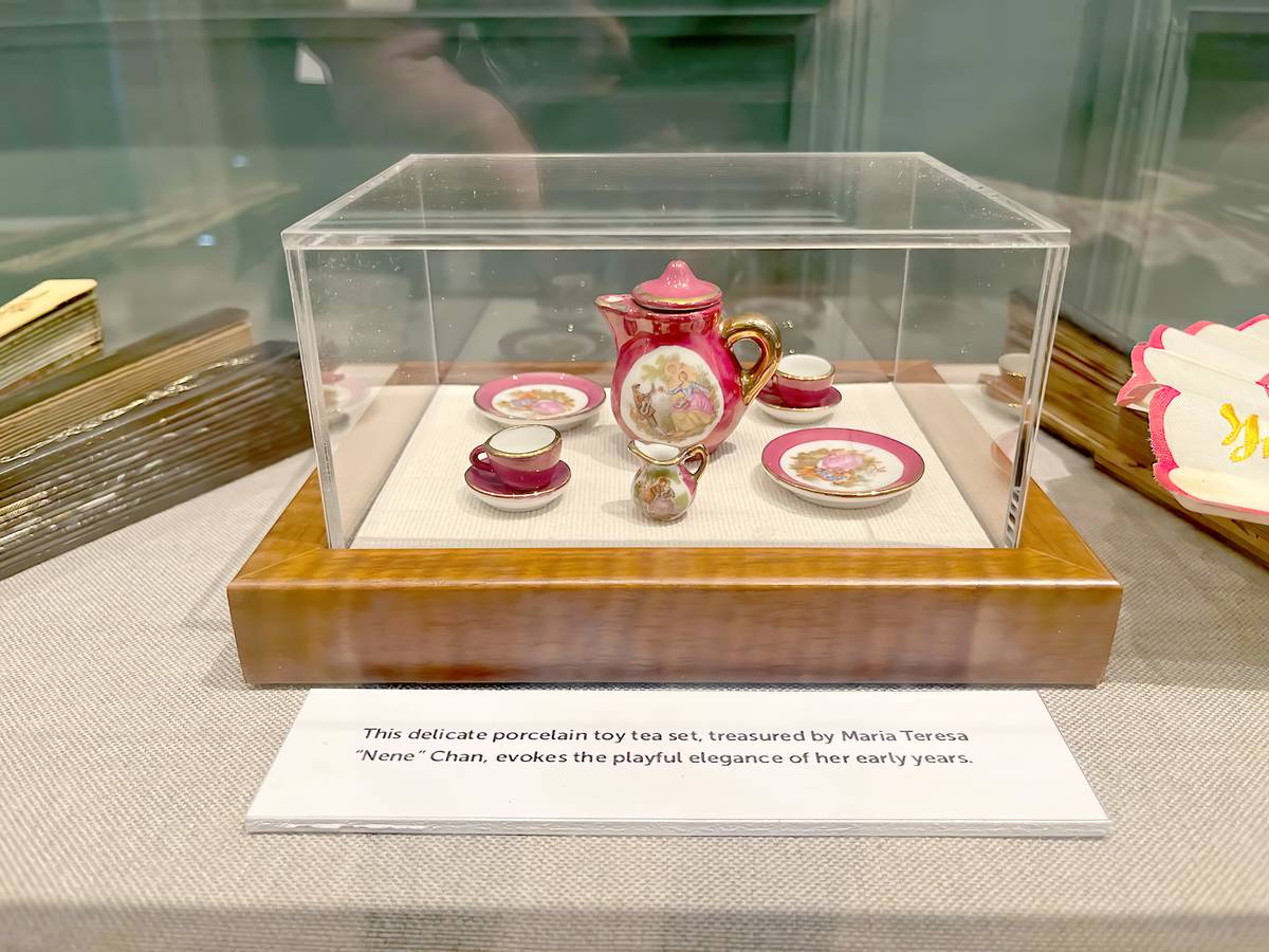 A MINIATURE porcelain tea set on display at the Casa de España museum.