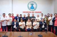 Laguna Governor Sol Aragones sits at the center of a group of municipal mayors and provincial officials posing the center of a group of municipal mayors and provincial officials posing with raised fists inside the Laguna Provincial Capitol in Santa Cruz on 12 October 2026. The provincial government seal is displayed on the wall behind them.