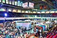Wide-angle view of the 2026 RSTW CALABARZON, showing participants, exhibition booths and technology displays inside the Quezon Convention Center in Lucena City.
