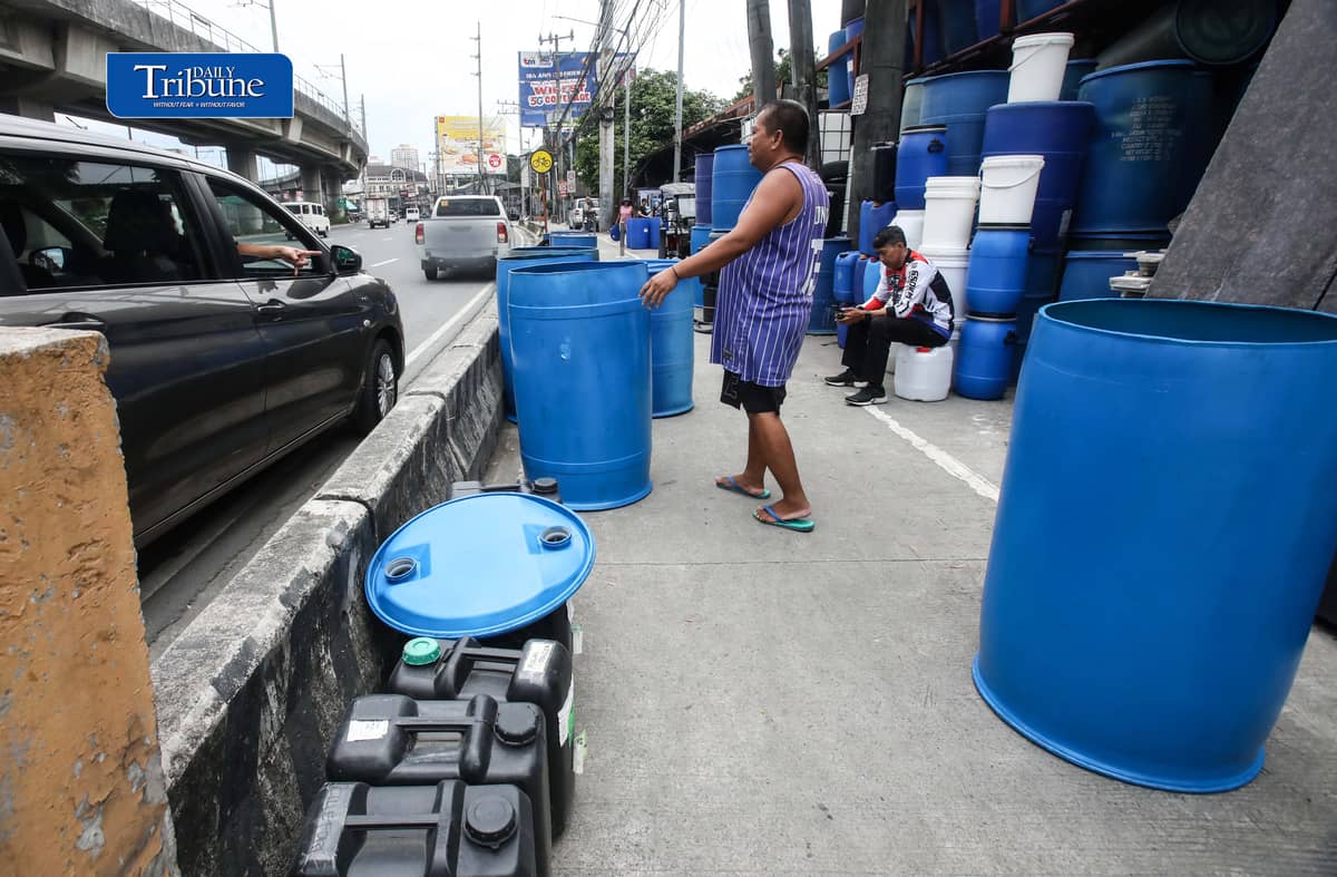 (October 13 2026) A Vendor tends customers buying water storage drums along Marcos Highway in Marikina City on Tuesday October 13 2026. In response to the President Ferdinand  Marcos Jr. call that the public have to buy pail or water storage drums and collect rainwater as a practical preparation for the expected Super El Niño in the country. According to the President, the government will teach the public how to purify the collected rainwater and will also distribute the necessary water filters. Photo/Analy Labor