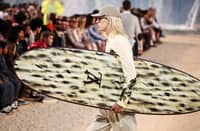 A model presents a creation for Louis Vuitton for the Menswear Spring/Summer 2027 collection fashion show as part of the Paris Fashion Week, in Paris, on 23 June, 2026.