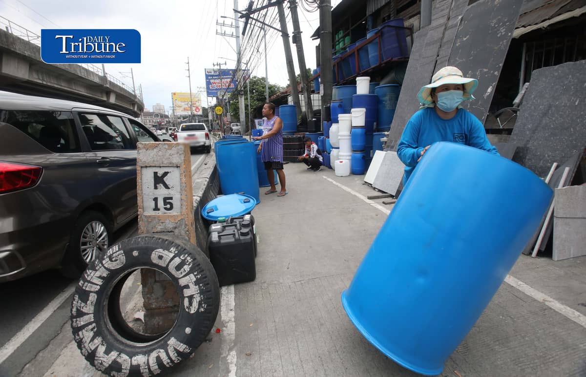 (October 13 2026) A Vendor tends customers buying water storage drums along Marcos Highway in Marikina City on Tuesday October 13 2026. In response to the President Ferdinand  Marcos Jr. call that the public have to buy pail or water storage drums and collect rainwater as a practical preparation for the expected Super El Niño in the country. According to the President, the government will teach the public how to purify the collected rainwater and will also distribute the necessary water filters. Photo/Analy Labor