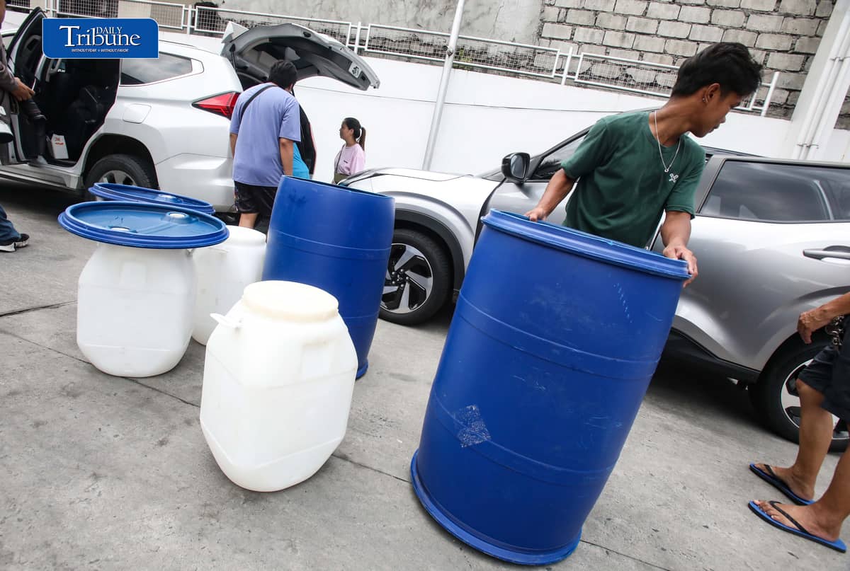 (October 13 2026) A Vendor tends customers buying water storage drums along Marcos Highway in Marikina City on Tuesday October 13 2026. In response to the President Ferdinand  Marcos Jr. call that the public have to buy pail or water storage drums and collect rainwater as a practical preparation for the expected Super El Niño in the country. According to the President, the government will teach the public how to purify the collected rainwater and will also distribute the necessary water filters. Photo/Analy Labor