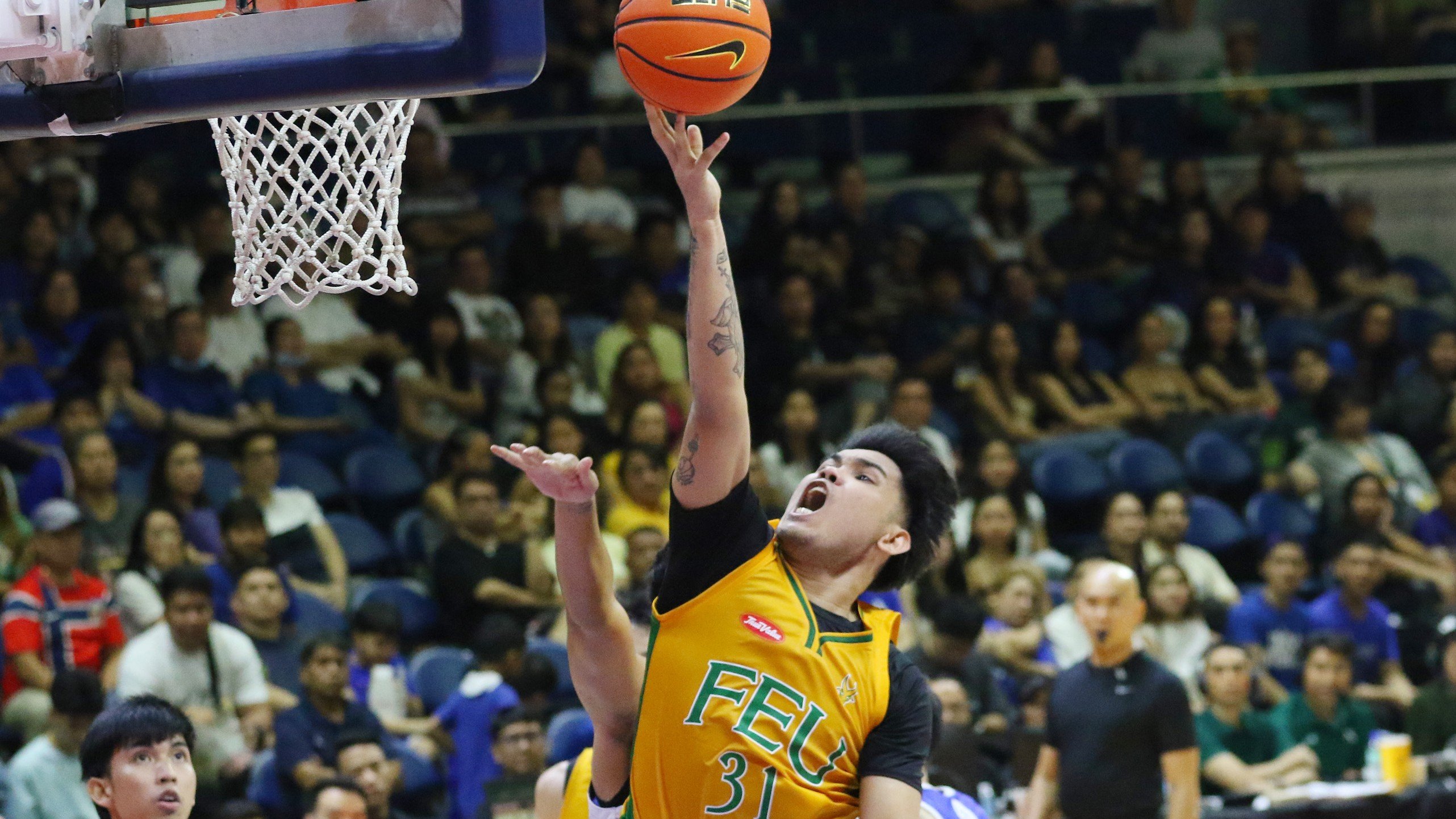 TAMING THE TIGERS: Chambers, FEU expect dogfight against dangerous UST