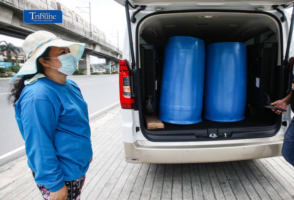 (October 13 2026) A Vendor tends customers buying water storage drums along Marcos Highway in Marikina City on Tuesday October 13 2026. In response to the President Ferdinand  Marcos Jr. call that the public have to buy pail or water storage drums and collect rainwater as a practical preparation for the expected Super El Niño in the country. According to the President, the government will teach the public how to purify the collected rainwater and will also distribute the necessary water filters. Photo/Analy Labor