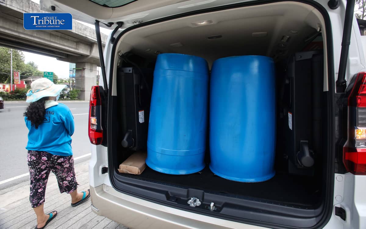 (October 13 2026) A Vendor tends customers buying water storage drums along Marcos Highway in Marikina City on Tuesday October 13 2026. In response to the President Ferdinand  Marcos Jr. call that the public have to buy pail or water storage drums and collect rainwater as a practical preparation for the expected Super El Niño in the country. According to the President, the government will teach the public how to purify the collected rainwater and will also distribute the necessary water filters. Photo/Analy Labor