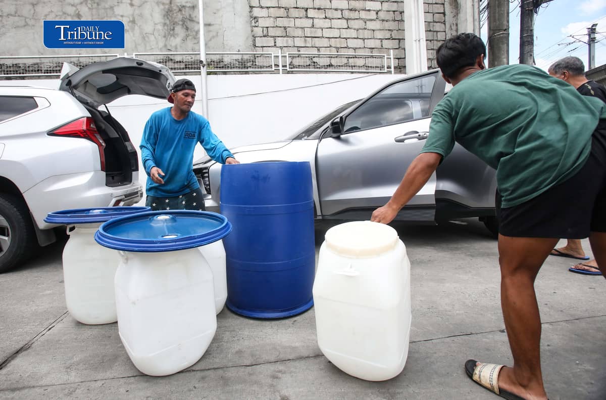 (October 13 2026) A Vendor tends customers buying water storage drums along Marcos Highway in Marikina City on Tuesday October 13 2026. In response to the President Ferdinand  Marcos Jr. call that the public have to buy pail or water storage drums and collect rainwater as a practical preparation for the expected Super El Niño in the country. According to the President, the government will teach the public how to purify the collected rainwater and will also distribute the necessary water filters. Photo/Analy Labor