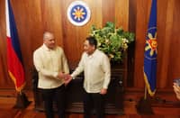 Newly installed acting-Secretary of Presidential Communications Office Lino Cayetano (left) and Information and Communications Office acting-Sec. Robert Joseph Montes de Claro took their oaths in Malacañang on Tuesday.