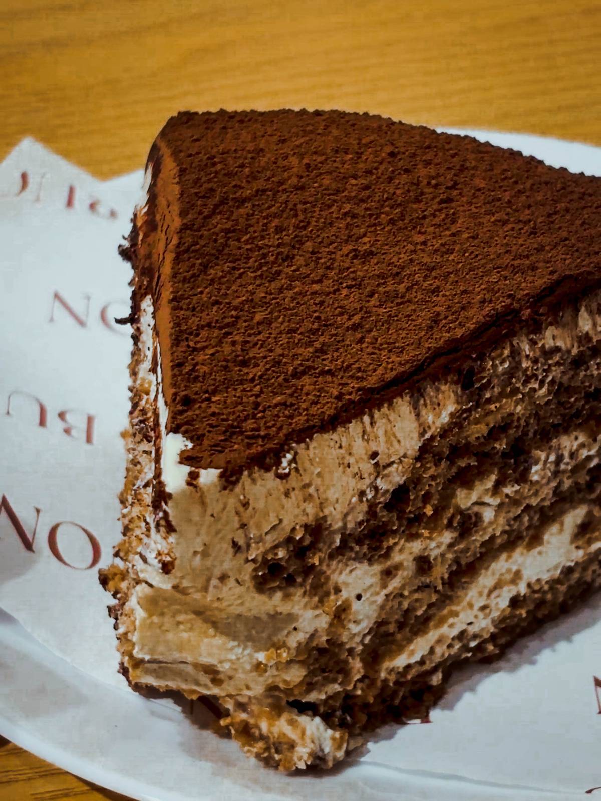 BUON's signature tiramisu layers espresso-soaked ladyfingers with rich mascarpone cream.