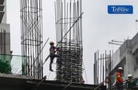 (October 14 2026) Construction workers do their task as they build a post at the ongoing construction building in Mandaluyong City on Wednesday October 14 2026. Photo/Analy Labor