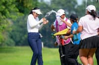 TIFFANY Lee gets doused with water in celebration after winning the ICTSI Pueblo de Oro Championship in Cagayan de Oro City.