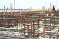 Steel reinforcement bars and concrete columns at the Balogo Port construction site in Santa Cruz, Marinduque.