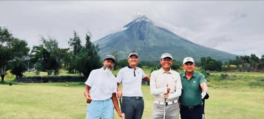 DOCKIE Ricky de Castro, Jerry Stehmeier and Dioey Bautista of Alabang 515, and Banjo Maddela of Riviera Golf cap their once-in-a-lifetime golf expedition by playing the Maon Golf Course against the backdrop of the majestic Mayon Volcano.