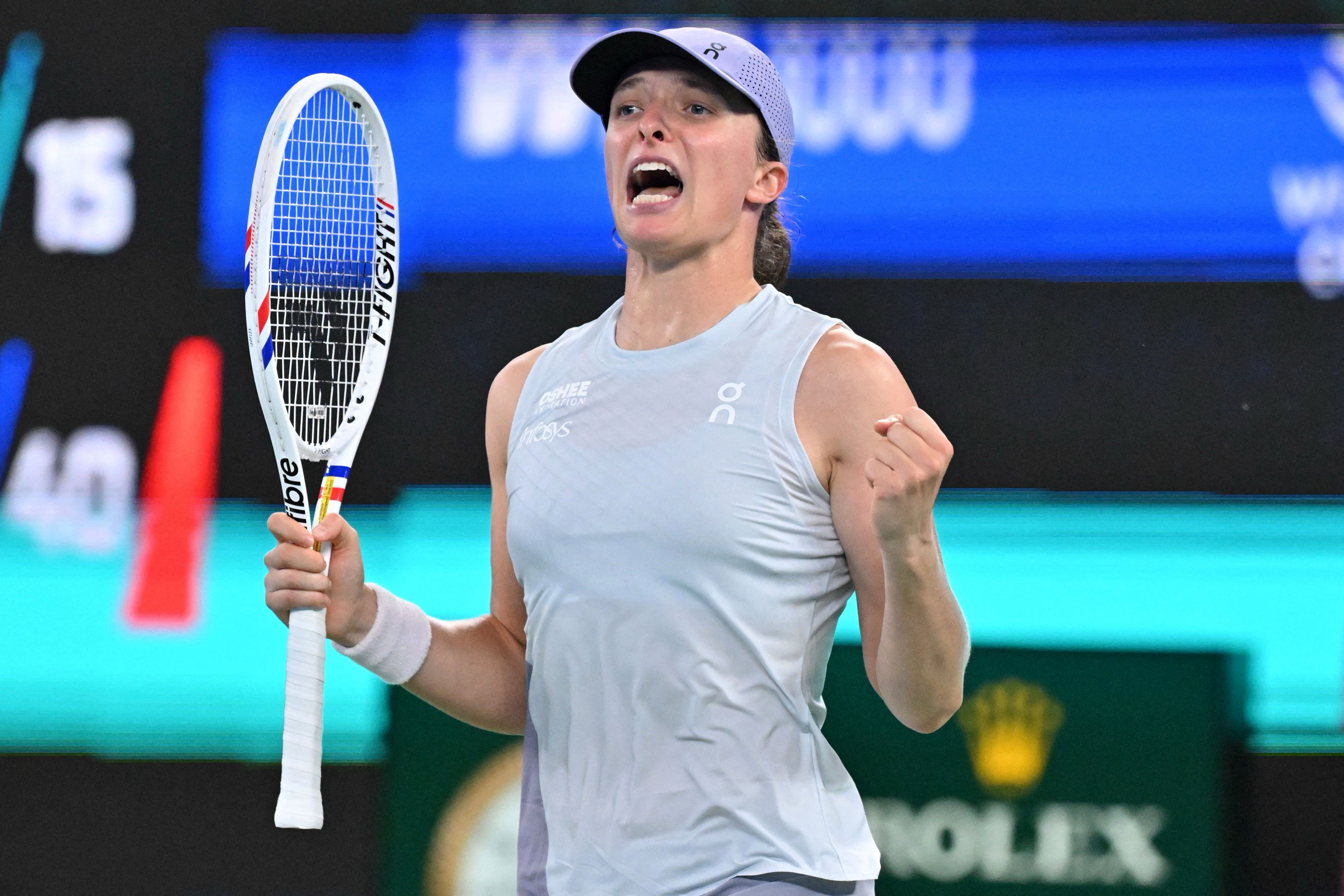 Swiatek coasts into Wuhan quarterfinals