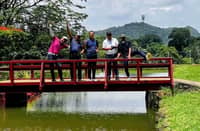 A MEMORABLE stop in their epic golf expedition, the four golfers pose at the iconic Pelaez Bridge at Del Monte Golf Course in Manolo Fortich, Bukidnon, with the landmark adding character to their journey across the country’s fairways.
