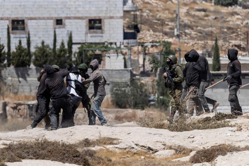 Israeli settlers attack US photographer covering West Bank violence