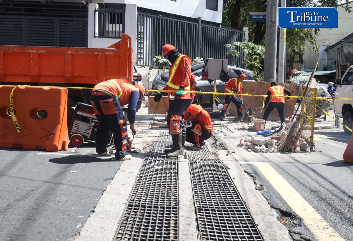 (October 16 2026) Department of Public Work and Highways DPWH personnel conduct and road repair along Judge Jimenez street in Quezon City on Friday October 16 2026. Photo/Analy Labor