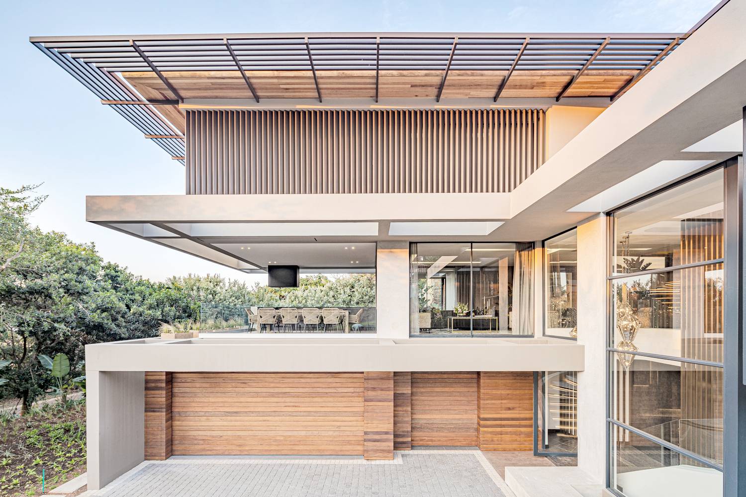 LARGE openings, shaded areas and open spaces help a modern Filipino home encourage natural airflow in a warm climate.
