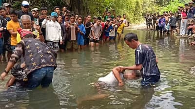 RESIDENTS retrieve the bodies of two farmers who engaged in a ritual called ‘Sulif’ to settle a land dispute.