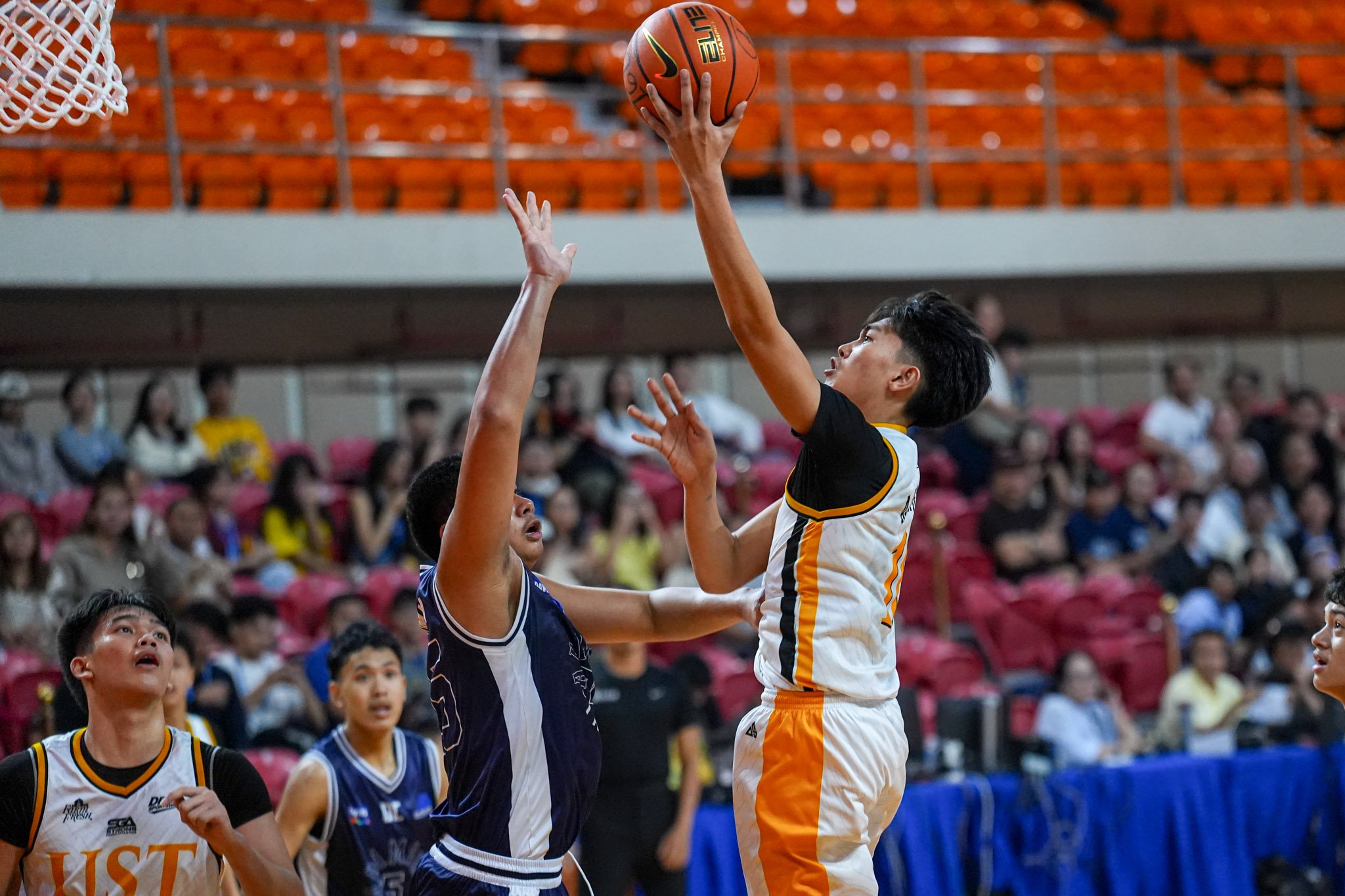 UST stops bleeding, rips Adamson by 56
