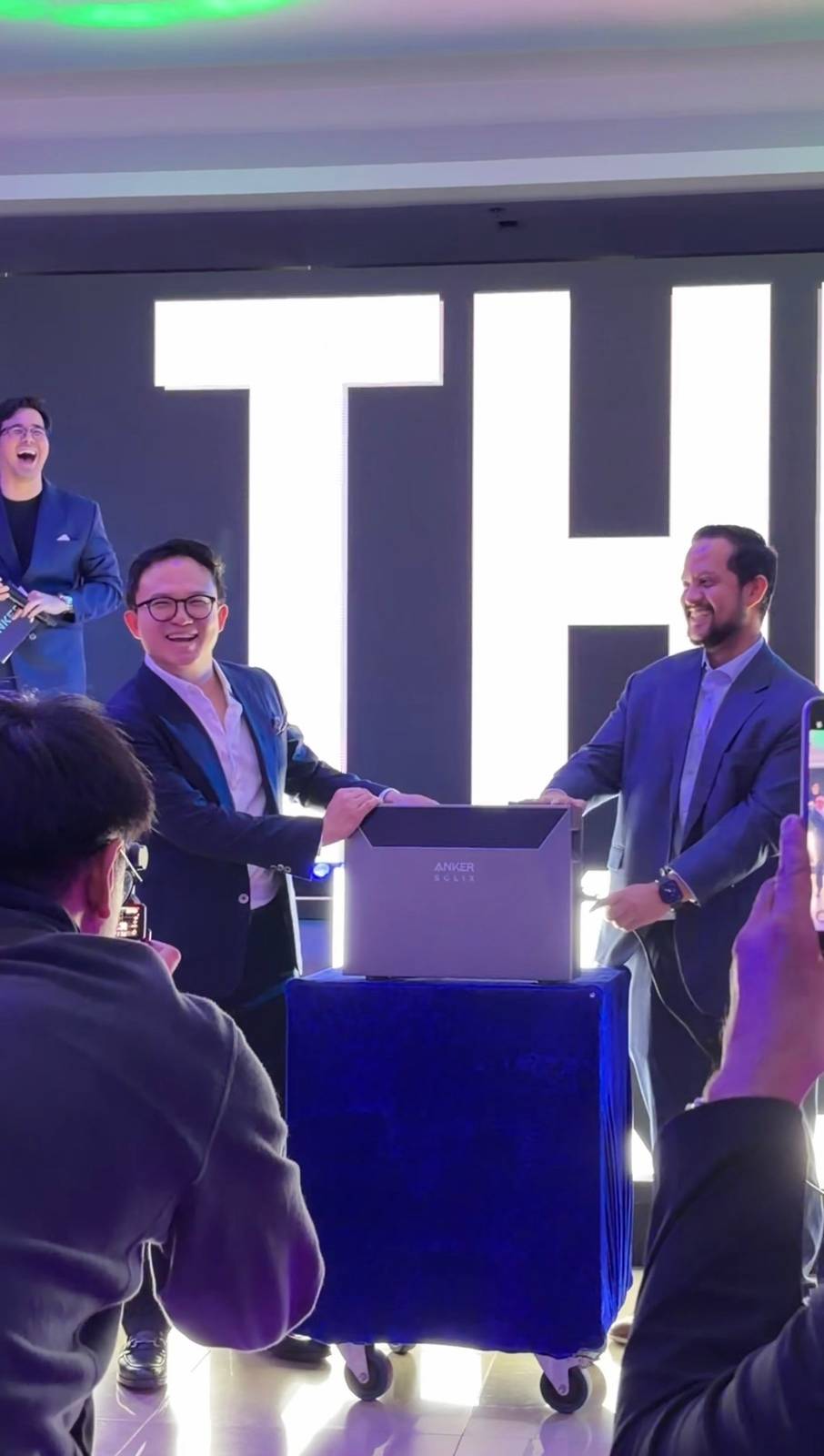 NAVCO Group President Ryan Tan and President and CEO of GoPrime Technology Corp. Engr. Bhong Bibi demonstrates the power of ANKER SOLIX's "Solar Bank 4" in BGC, Taguig City.