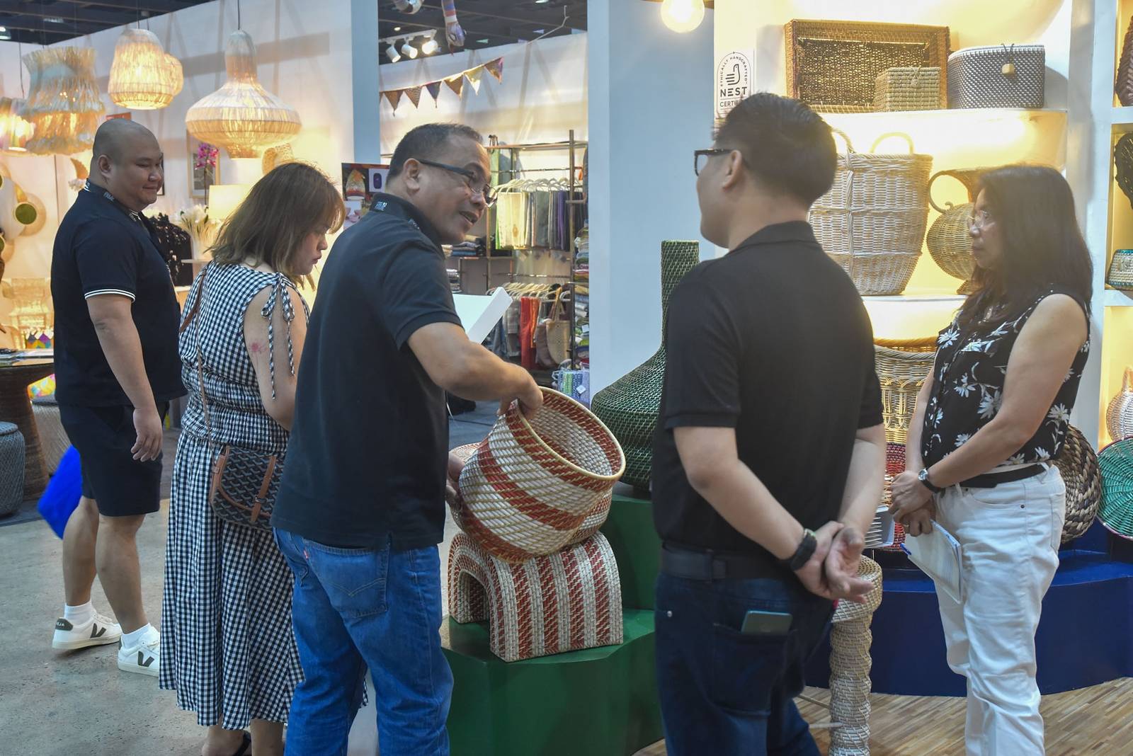 Locally made furniture, interior decor along with handcrafted products take the spotlight as visitors explore the final day of the 74th Manila FAME, themed “Bloom,” at the World Trade Center Metro Manila in Pasay City on October 18. 

The export trade show brings together around 400 Philippine manufacturers and brands, promoting Filipino craftsmanship and sustainable materials to global markets. | Zedrich Xylak Madrid