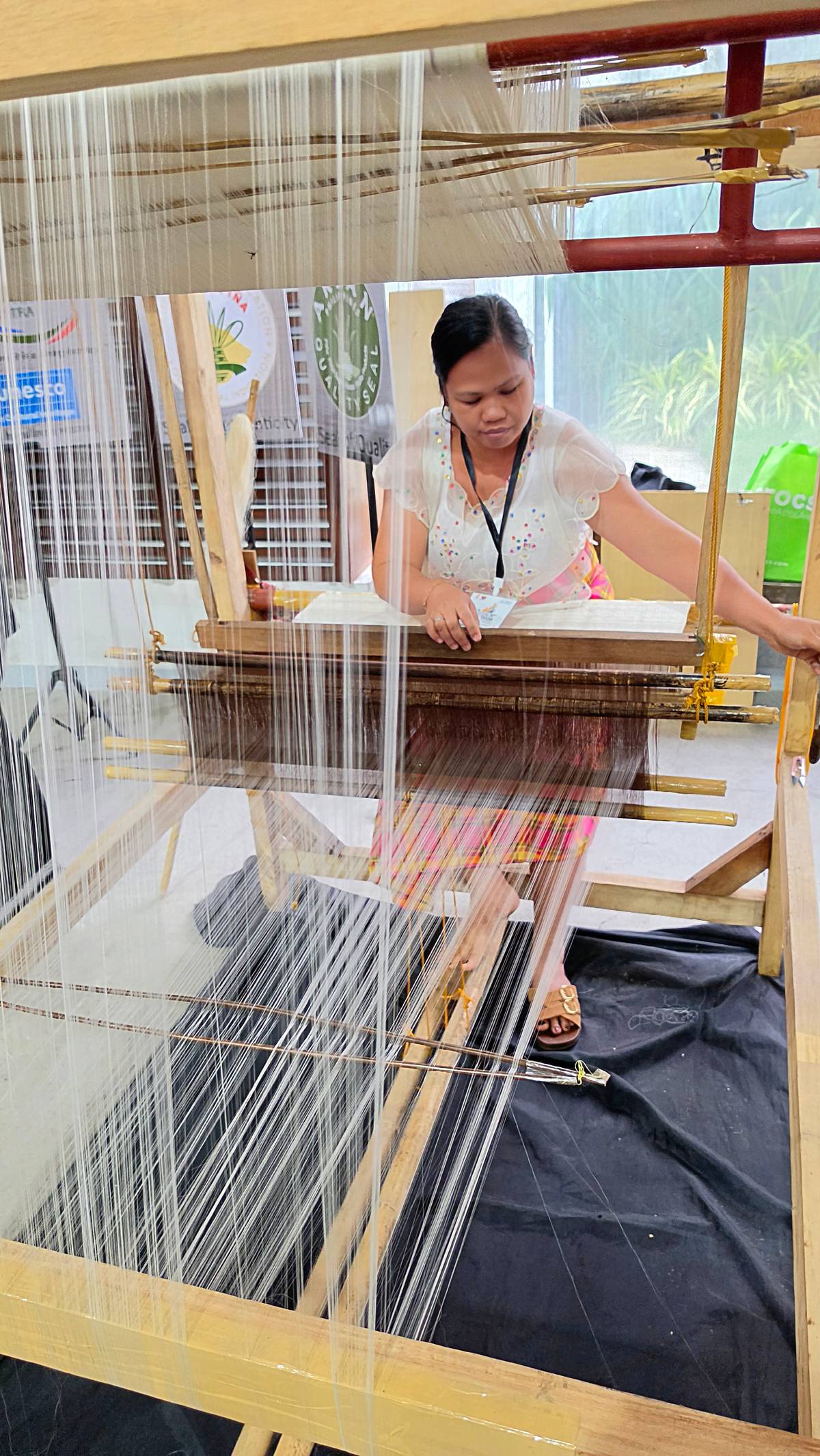 AKEANON weaver making piña, the pineapple leaf textile.