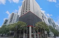 RED Planet BGC The Fort stands along a busy street in Taguig City.