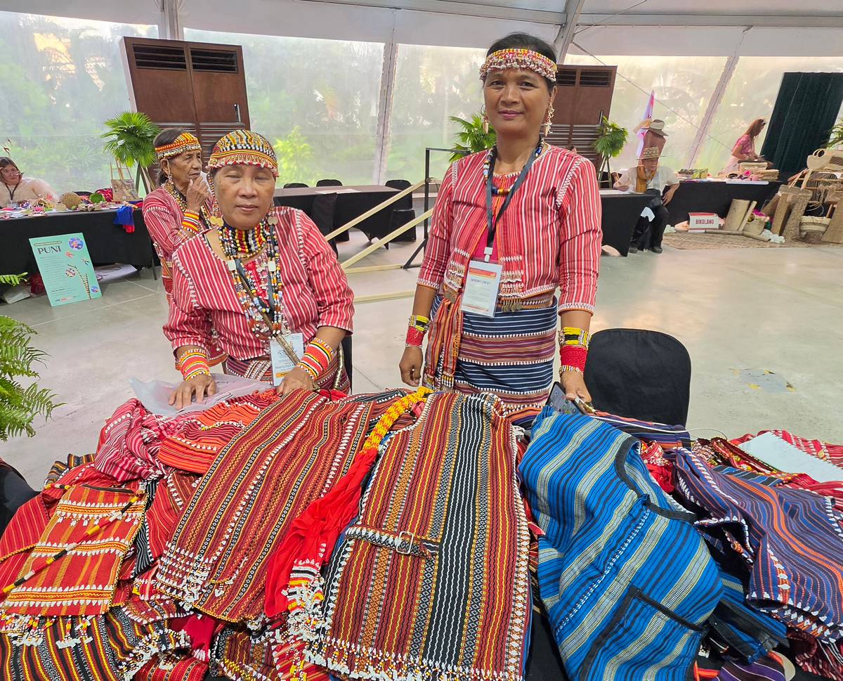 GA’DANG delegates from Paracelis, Mountain Province, showing off their handwoven and embroidery products.