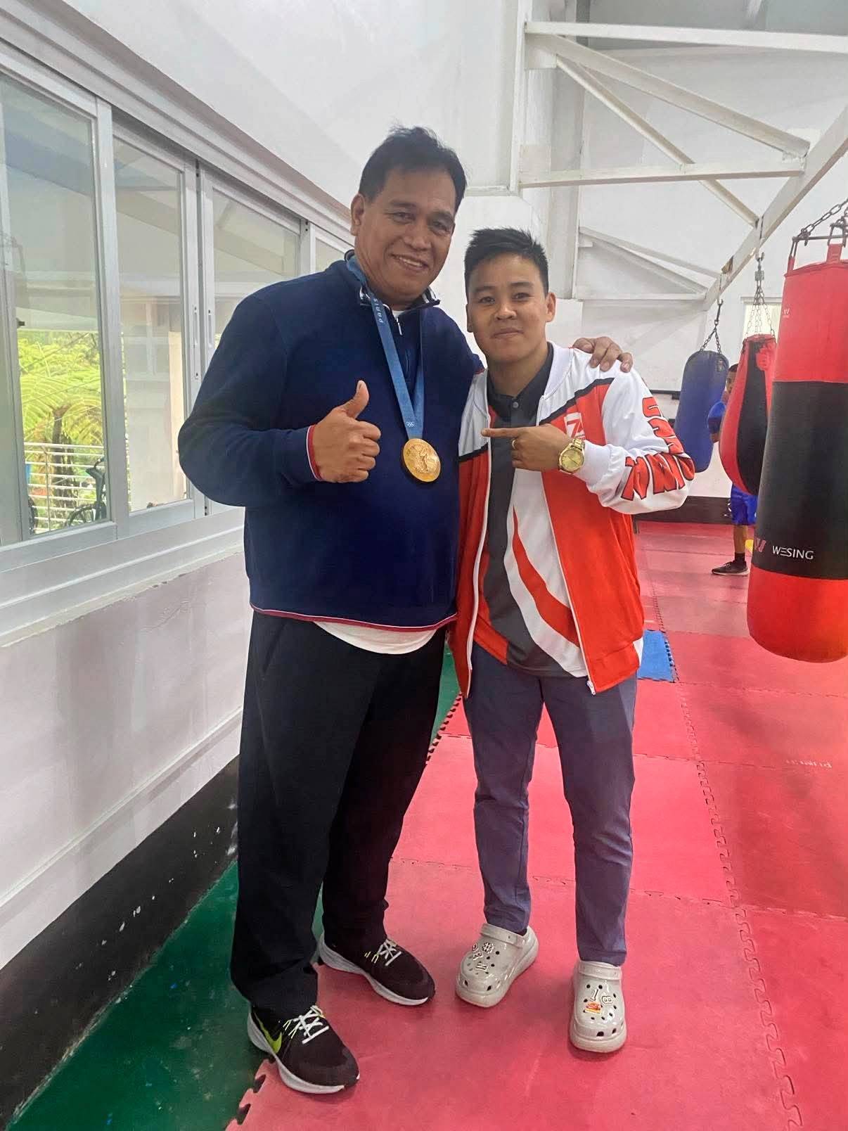 PAT Gaspi strikes a pose with two-time Olympic medalist Nesthy Petecio.