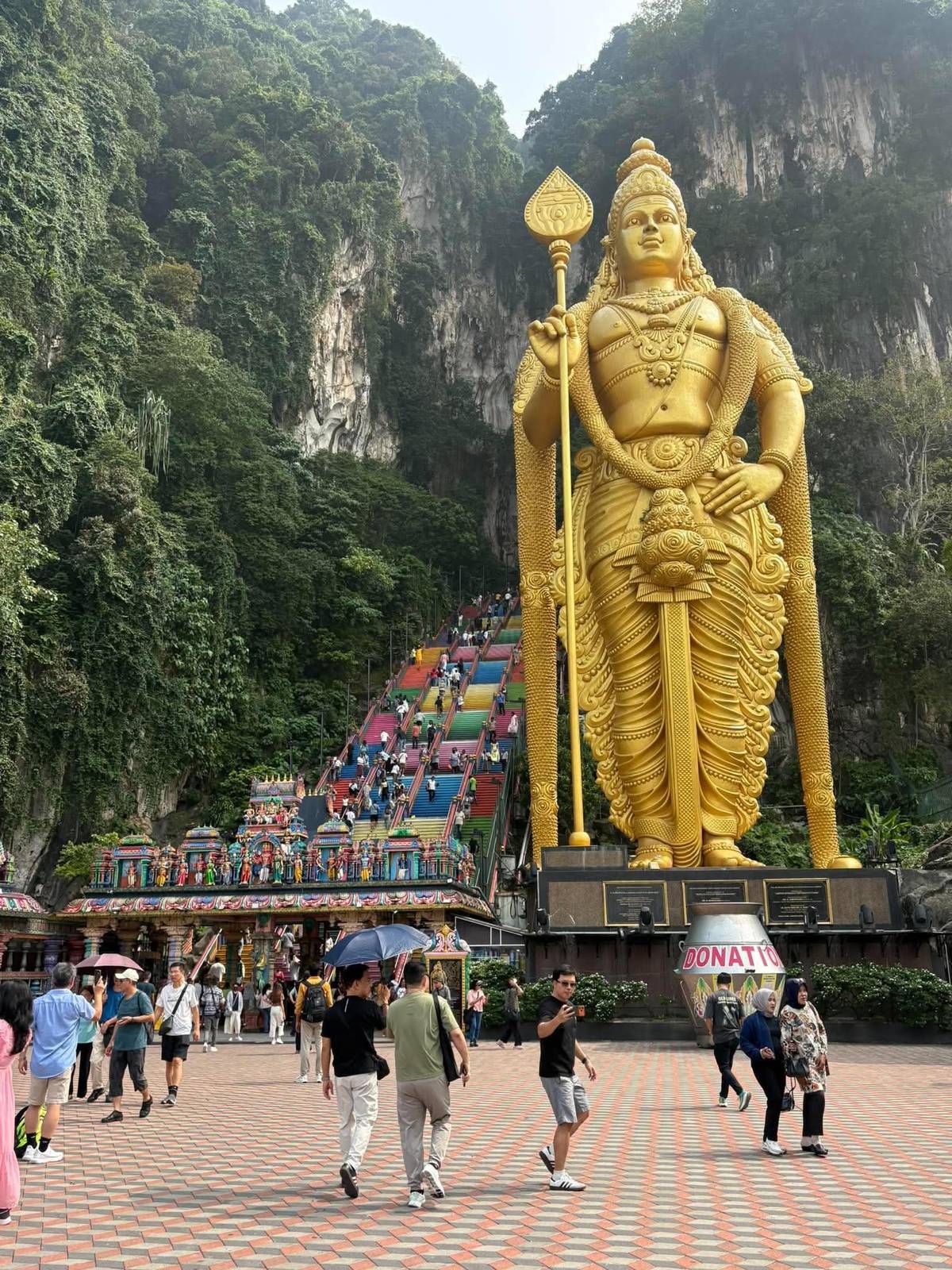 THE towering golden statue of Lord Murugan welcomes visitors to Batu Caves, one of Malaysia’s most iconic cultural and religious attractions.