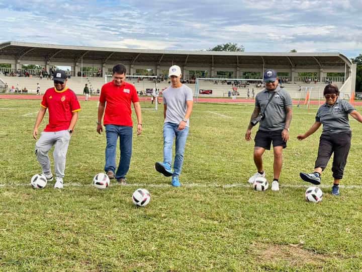 FOOTBALL DEVELOPMENT. Officials and event participants take part in a ceremonial football kickoff at the Laguna Sports Complex in Santa Cruz during the second Capitol Cup, held on 17 and 18 October 2026 to promote grassroots football development and sportsmanship