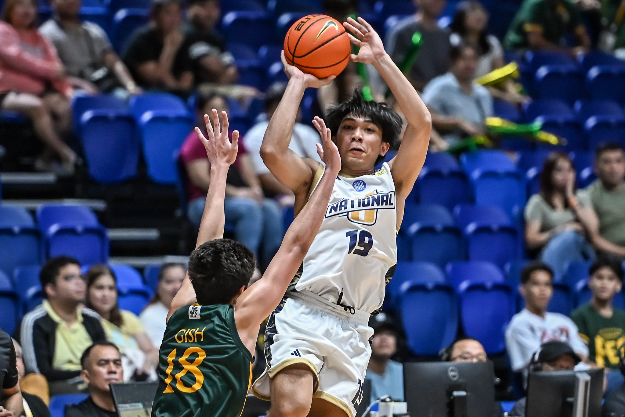 NU escapes FEU to finish first round on top
