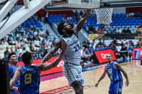 CAMERON Clark powers Converge with 27 points en route to a 114-112 overtime win over TNT on Sunday in the PBA Governors’ Cup.