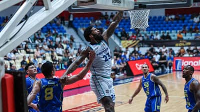 CAMERON Clark powers Converge with 27 points en route to a 114-112 overtime win over TNT on Sunday in the PBA Governors’ Cup.