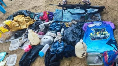 MILITARY hardware, including a squad automatic rifle and an improvised explosive device, is displayed after troops from the Philippine Army’s 8th Infantry Division engaged remnants of the Communist Terrorist Group in Barangay Capotuan, Las Navas, Northern Samar, on Sunday.