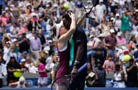France's Gael Monfils and Ukraine's Elina Svitolina embrace during their mixed doubles tennis match against Czech Republic's Katerina Siniakova and Britain's Henry Patten during Fan Week as part of the 2026 US Open tennis tournament at the USTA Billie Jean King National Tennis Center in New York on August 25, 2026.