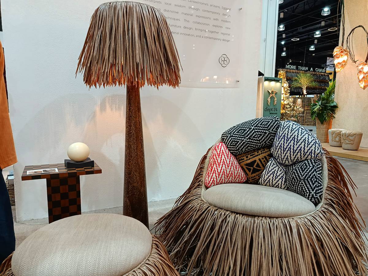 TRADITIONAL-INSPIRED armchair, paired with an ottoman and floor lamp.
