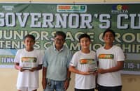 LIAM Harrow (second from right) and Prince Centino (right) hold their shared MVP trophy alongside girls’ division top player Zaia Gumbao (left) and Pagadian City Sports head Alfred Cimafranca during the awarding of the Governor’s Cup Juniors Age Group Tennis Championships at the Dao courts in Pagadian City.