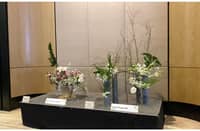 Ikebana arrangements displayed by the Tokyo Founding Chapter of Japan and the Karachi Chapter of Pakistan.