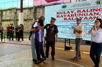 First Lady Louise Araneta Marcos hugs PDL Jose Lobiano who was released Tuesday, 20 October 2026, the same day his documents was reviewed . Looking on are Bureau of Corrections Director General Gregorio Pio P. Catapang Jr. and Justice Undersecretary Deo Marco.
Lobiano was among the 43 released under the Bilis Laya Program . Courtesy of BuCor
