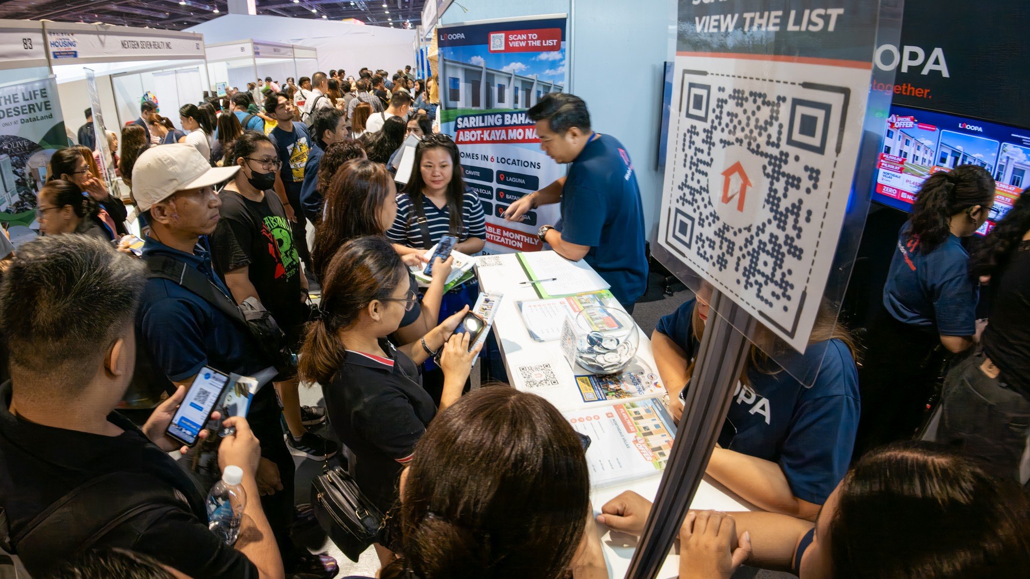 PAG-IBIG Fund members flock to the SMX Convention Center in Pasay City on Tuesday for the 2nd National Housing Expo 2026, which brings together homebuyers, property developers and financing institutions to showcase affordable housing options and help Filipinos explore homeownership opportunities.