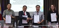 Labor Secretary Francis N. Tolentino and Philippine Judicial Academy Chancellor Justice Edgardo L. Delos Santos shake hands after signing a five-year agreement supporting the National Academy of Labor Justice in Tagaytay City on 21 October 2026. The partnership will strengthen training for officials handling labor disputes and protecting workers’ rights.