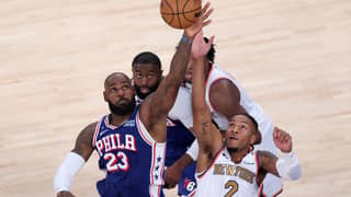 NEW YORK, NEW YORK - OCTOBER 20: LeBron James #23 of the Philadelphia 76ers and Miles McBride #2 of the New York Knicks battle for possession on a jump ball during the second quarter of the game at Madison Square Garden on October 20, 2026 in New York City.