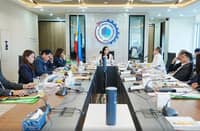 PEZA Board Chair and DTI Secretary Cristina Roque (center) presides over the PEZA Board meeting on 14 October 2026.