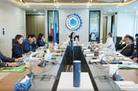 PEZA Board Chair and DTI Secretary Cristina Roque (center) presides over the PEZA Board meeting on 14 October 2026.