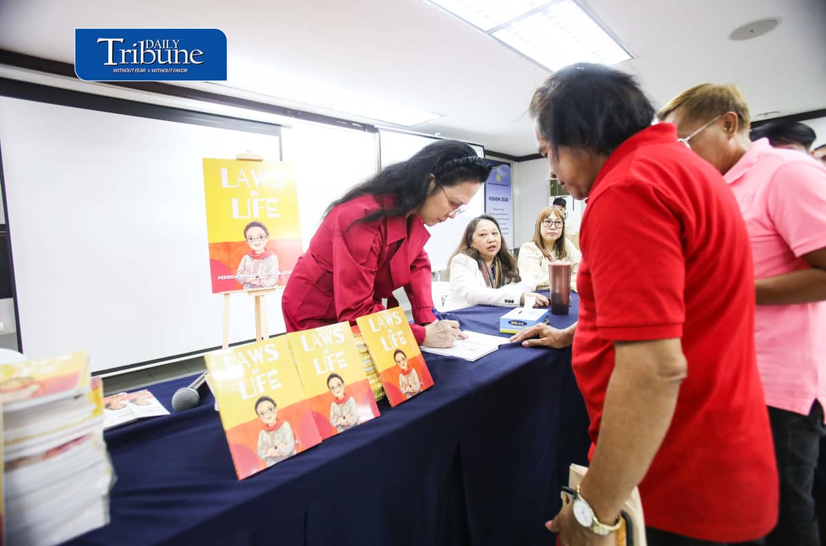 (October 22 2026) Members of the Media queue for the autograph of Public Attorney’s Office Chief Persida Rueda-Acosta, as PAO Chief give her book “Laws of Life” for free, and they also avail the free check up and medicine, during a medical mission at the PAO Main Office at the DOJ Agencies Building in Quezon City as part of their 54th anniversary celebration, providing free legal assistance and counsel to indigent litigants across the country. Photo/Analy Labor