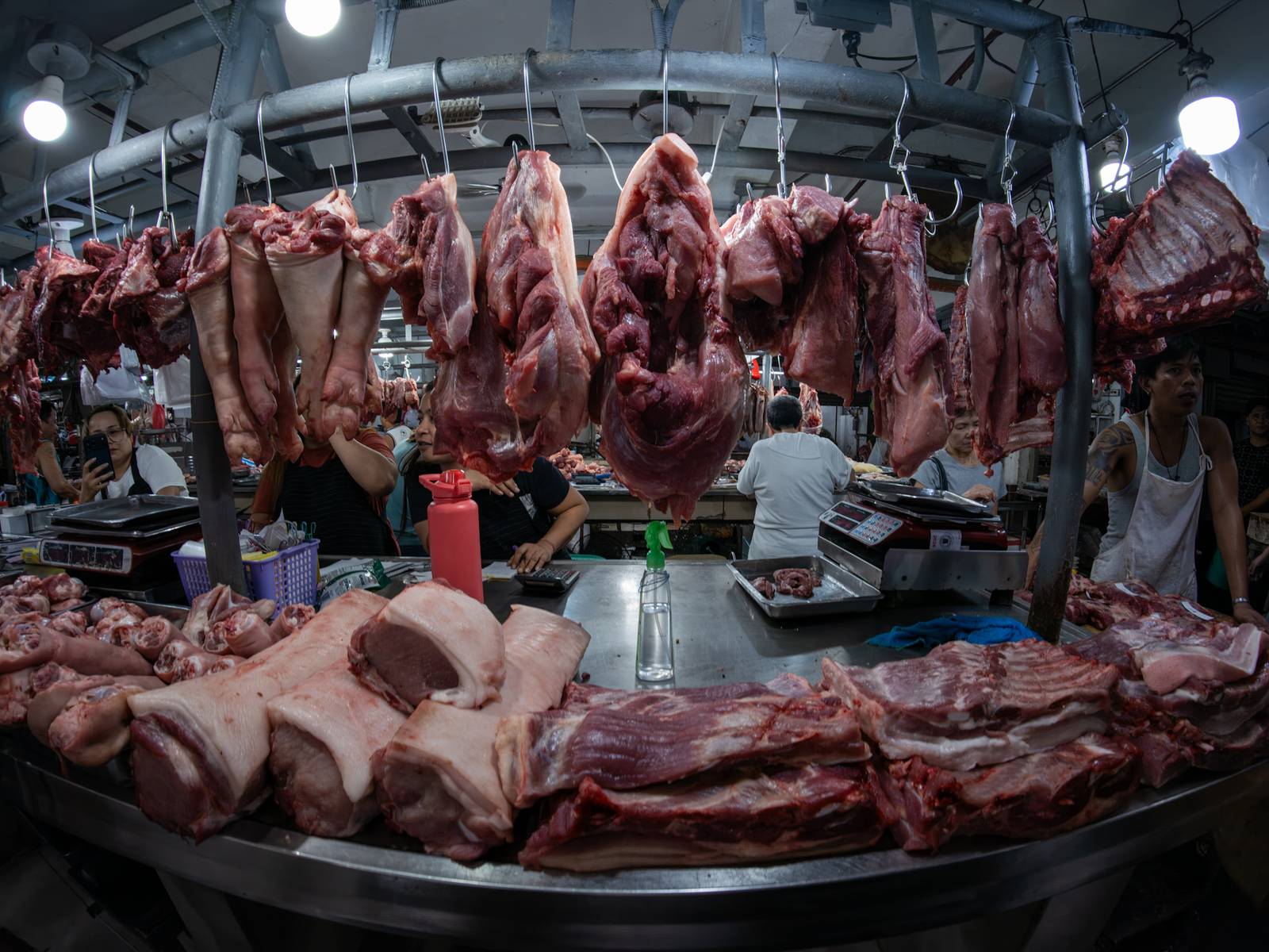 Pork cuts are displayed at a meat section of a public market in Manila on 22 October 2026. Local hog raisers nationwide have launched a three-day “pork holiday” from 22 to 24 October, voluntarily suspending live hog deliveries to markets to protest mounting industry losses, rising production costs and competition from imported pork. The protest aims to urge the government to review import policies and strengthen protection for the domestic hog industry.